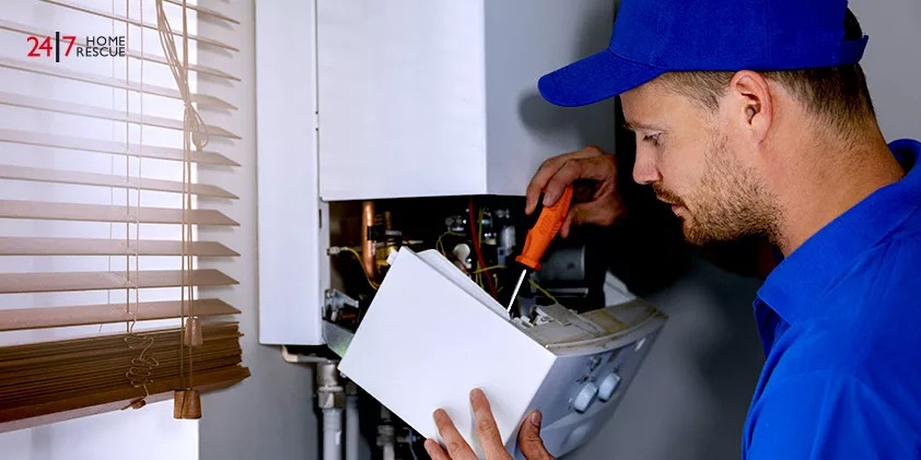 An engineer is checking a boiler