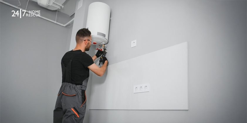 Engineer performing boiler maintenance check on a home heating system