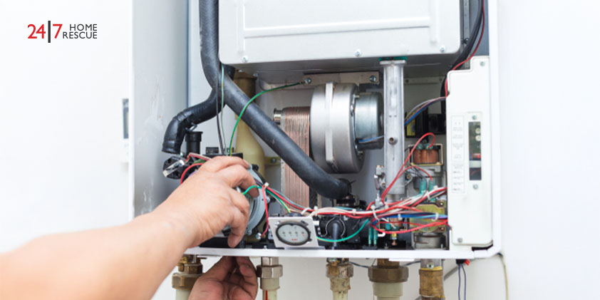 Gas Safe engineer checking boiler ignition fault and lockout issue