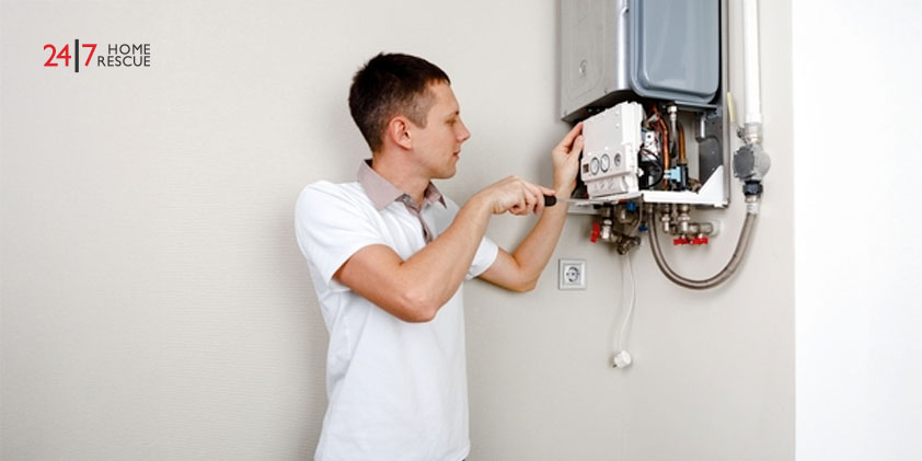 Engineer trying to fix the problem of a gas boiler