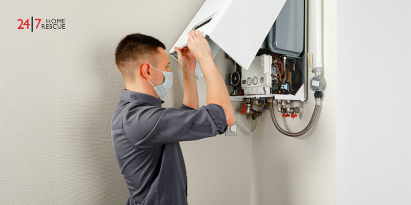 Worcester Boiler Fault 227: What It Means & How to Fix It Heating engineer replacing worn ignition electrode in Worcester gas boiler to fix ignition fault