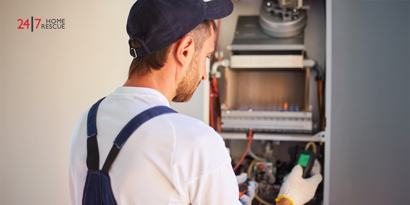 Worcester Boiler Fault 227: What It Means & How to Fix It Engineer adjusting ionisation probe in gas boiler to restore reliable flame detection