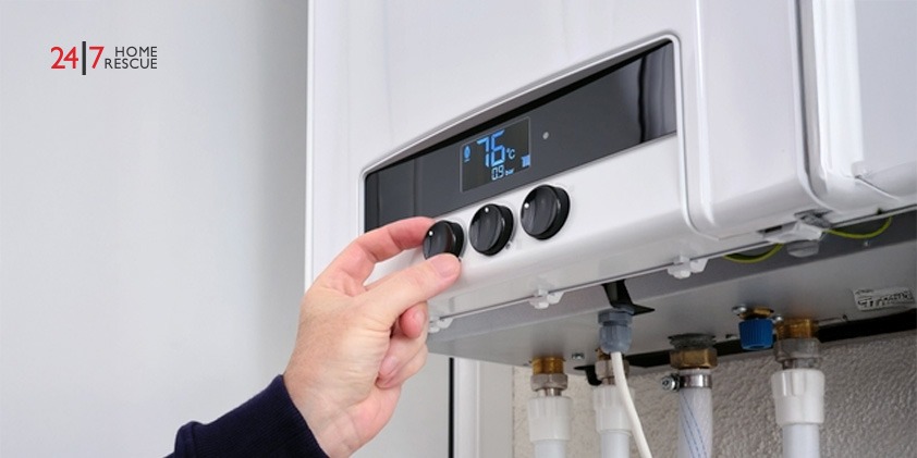 Combi Boiler Flow Rate Explained: A Homeowner’s Guide A man regulating heating in a combi boiler