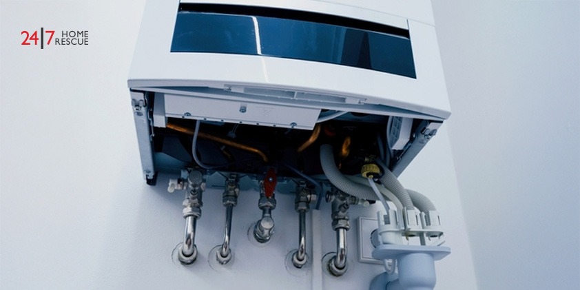 Can You Have a Boiler in a Bedroom? Important Factors to Consider An image showing the pipework of a modern gas boiler