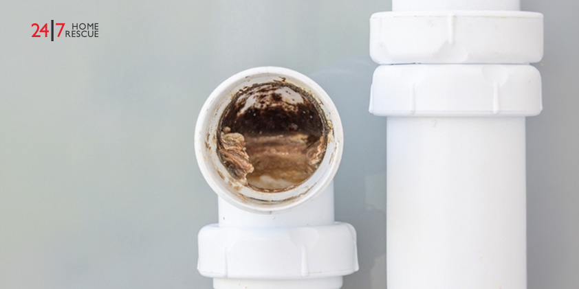 An engineer assessing for pipe obstructions