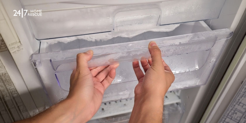 A frost buildup inside a freezer