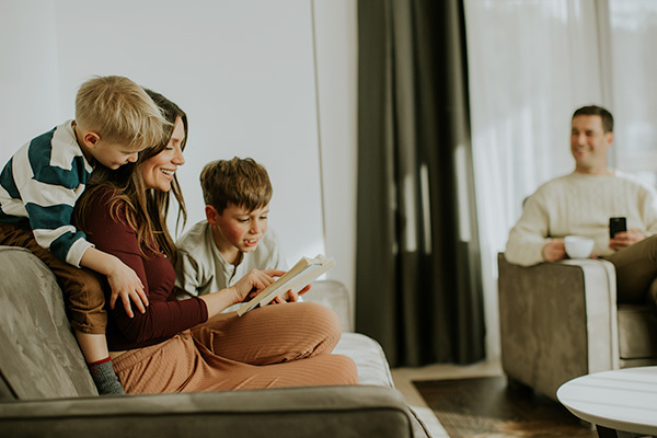 Family relaxing in living room